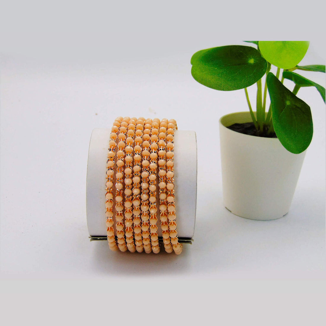 Beautiful Peach Colored Metal Bangles