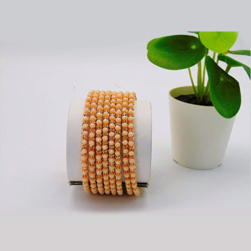 Beautiful Peach Colored Metal Bangles