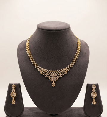 Delicate Gold Cubic Zirconia Necklace Set With Teardrop Pendant.