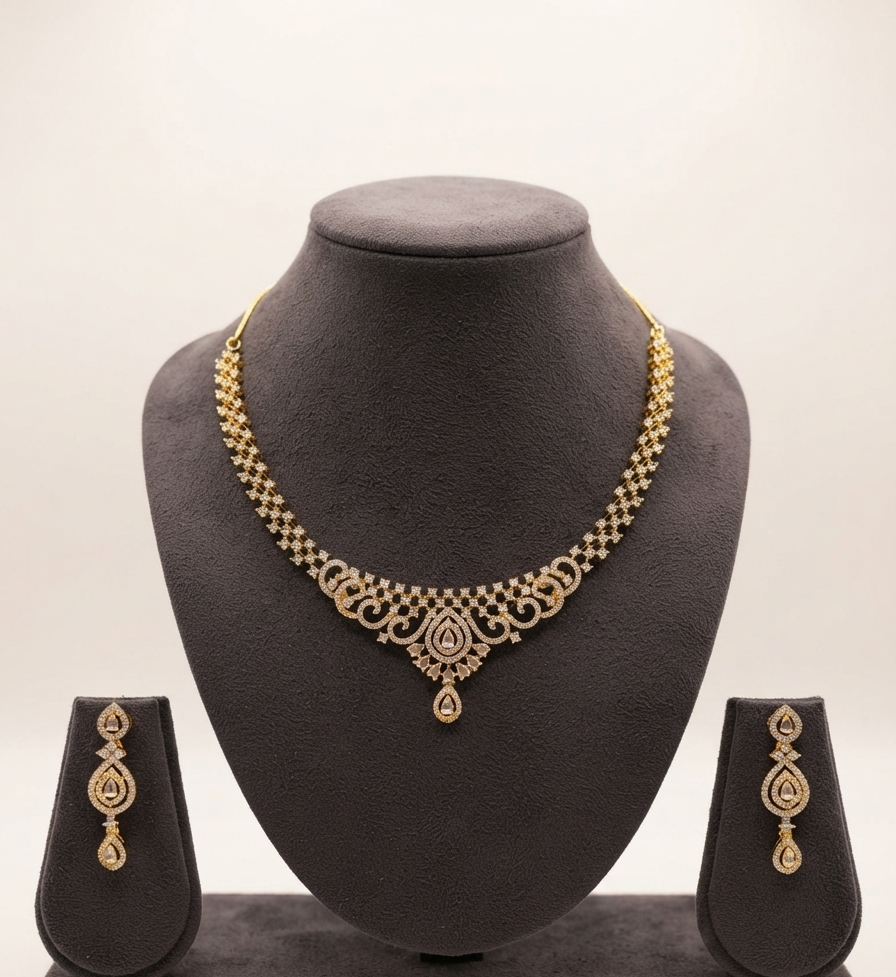Delicate Gold Cubic Zirconia Necklace Set With Teardrop Pendant.