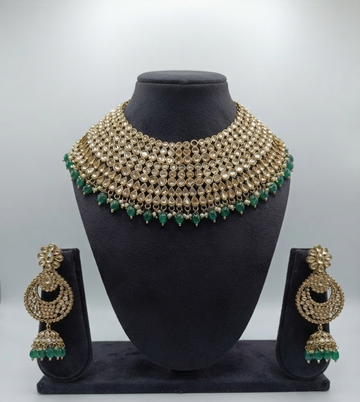 Broad Gold Kundan Bridal Choker Set With Green Beads.
