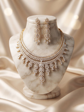 Modern gold-plated necklace and earring set with brilliant CZ crystals.