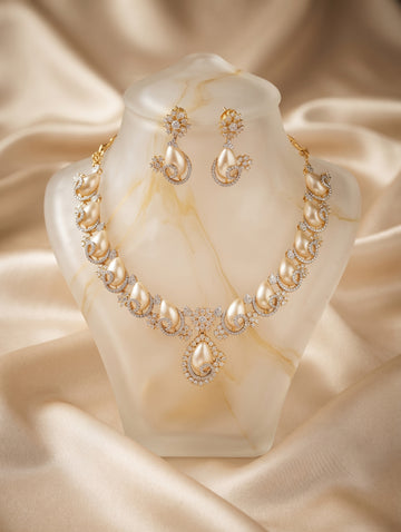 Modern, gold plated necklace and earring set with brilliant CZ crystals.