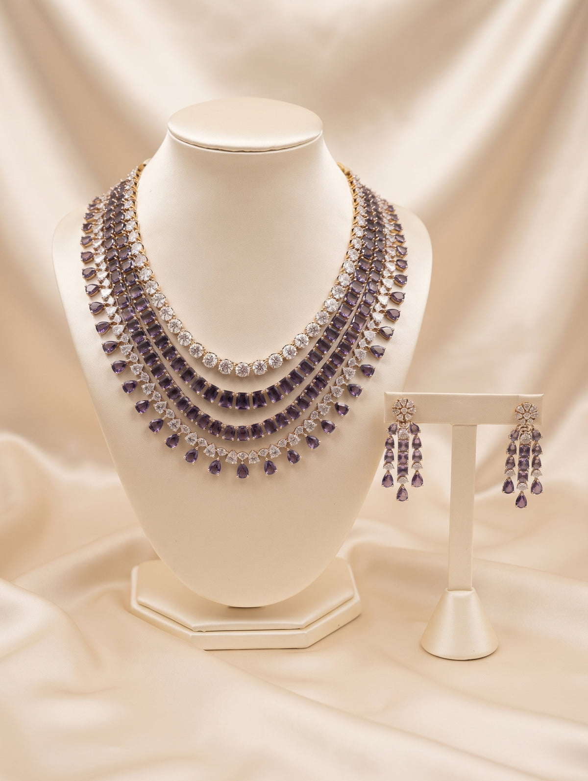 Gold plated necklace with cubic zirconia and purple crystals