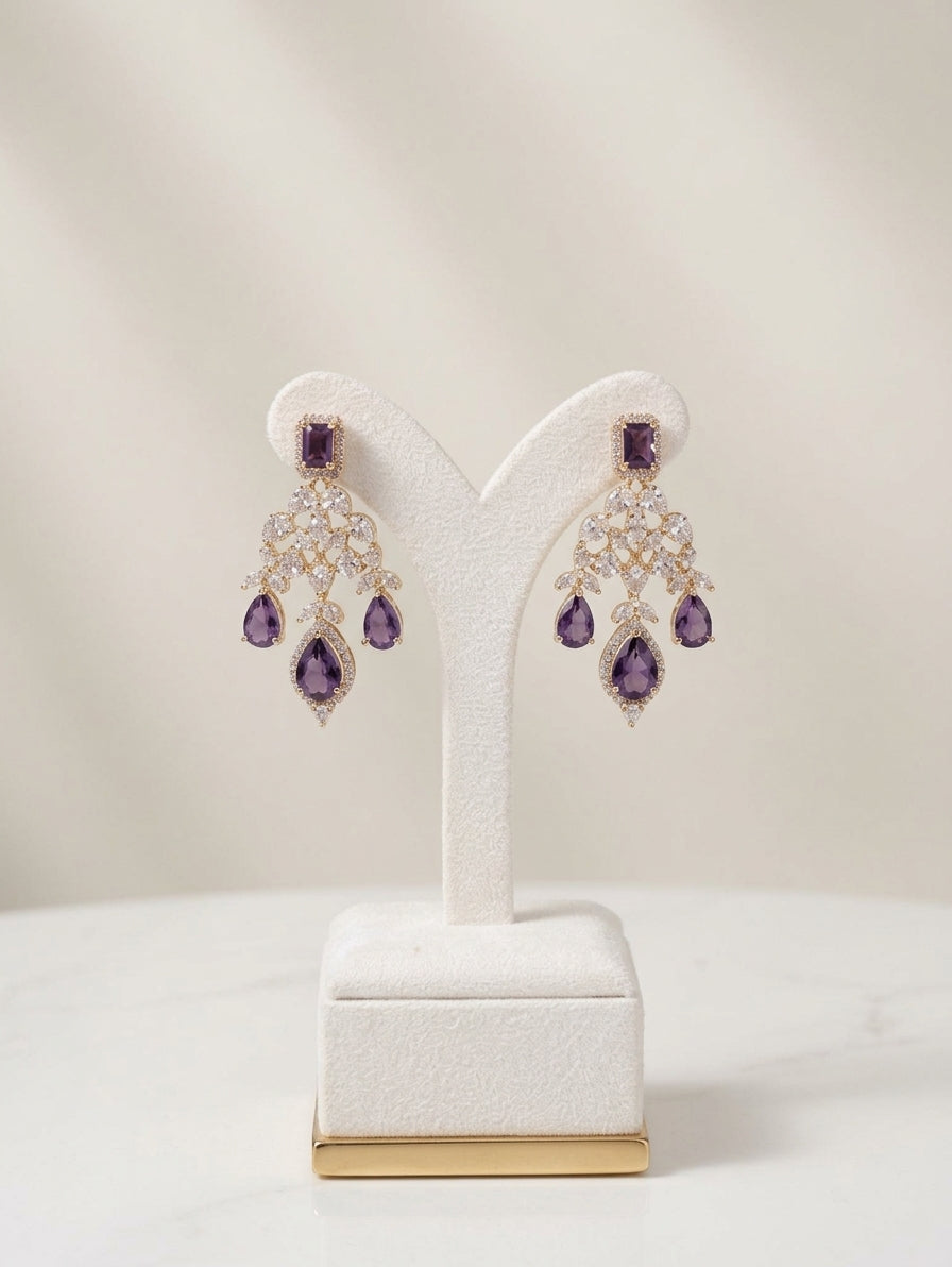 Gold and rhodium-plated necklace set with purple crystals and CZ earrings.