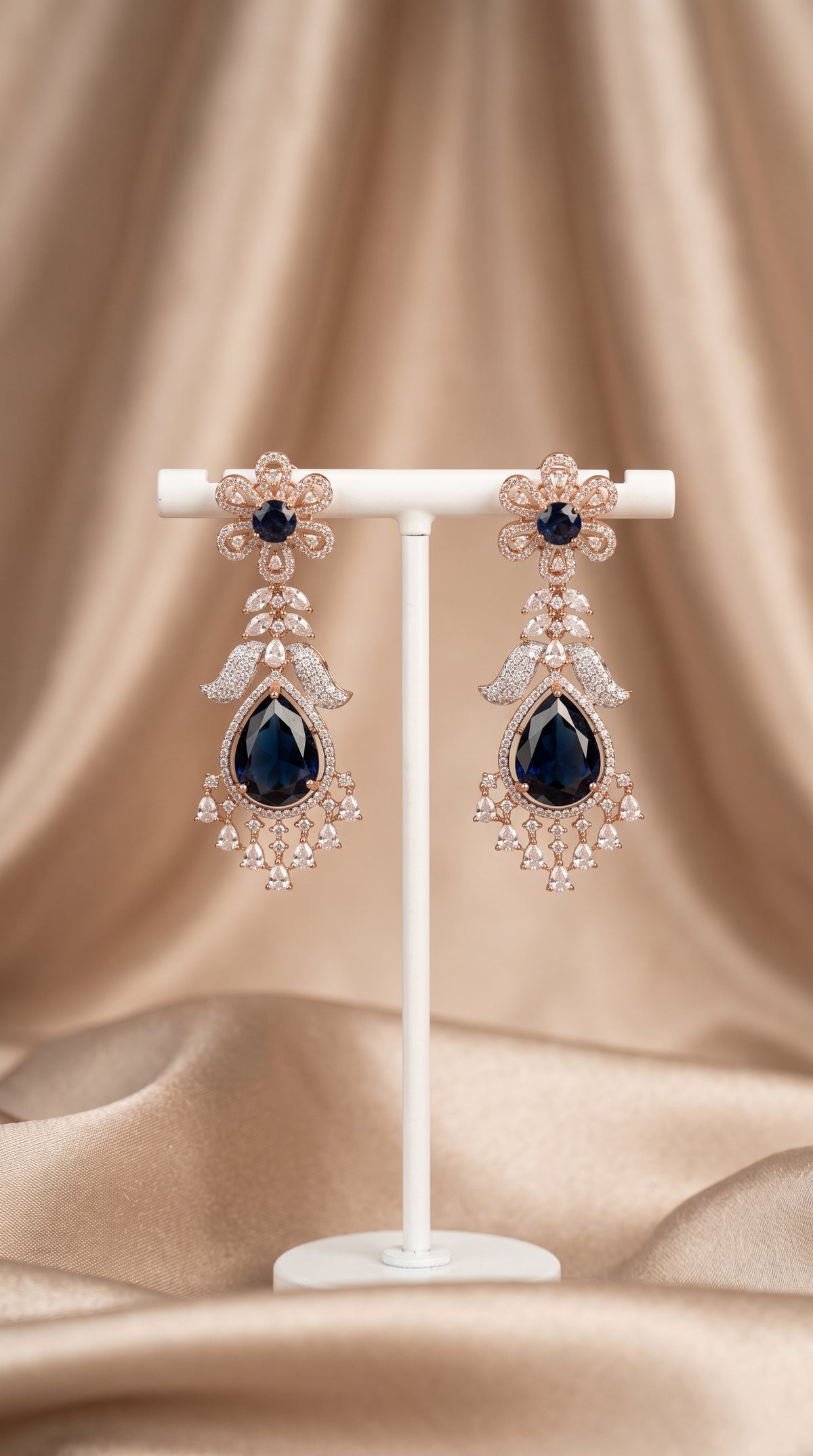 Rose gold plated necklace earring set with blue cubic zirconia crystals