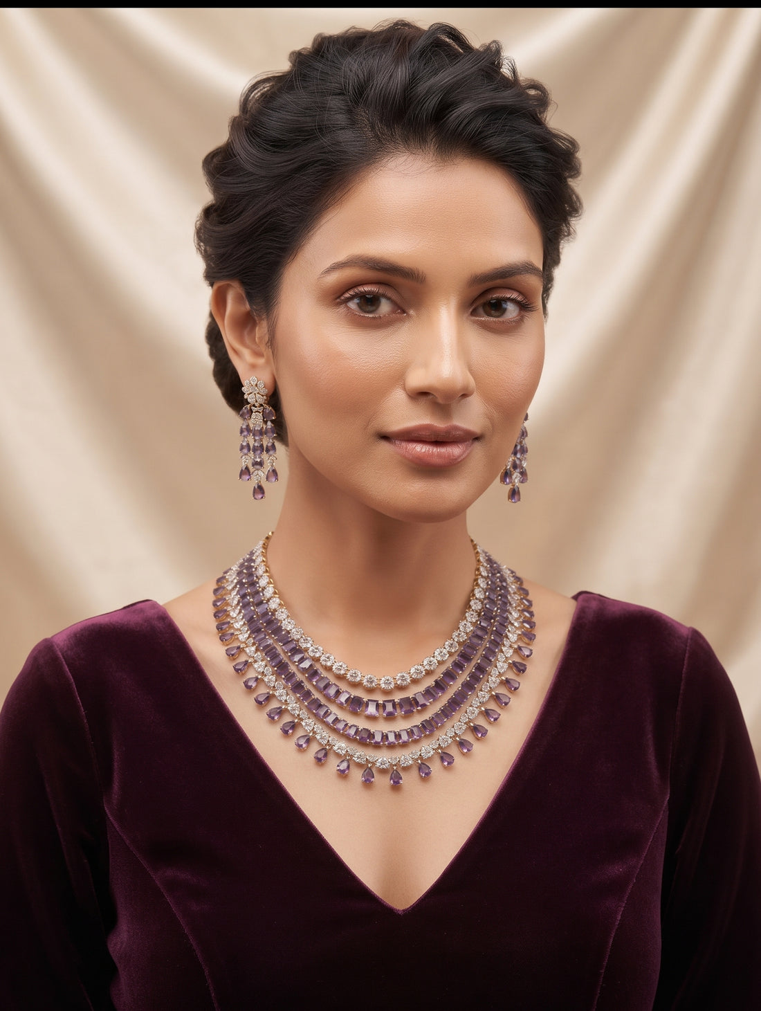 Gold plated necklace with cubic zirconia and purple crystals