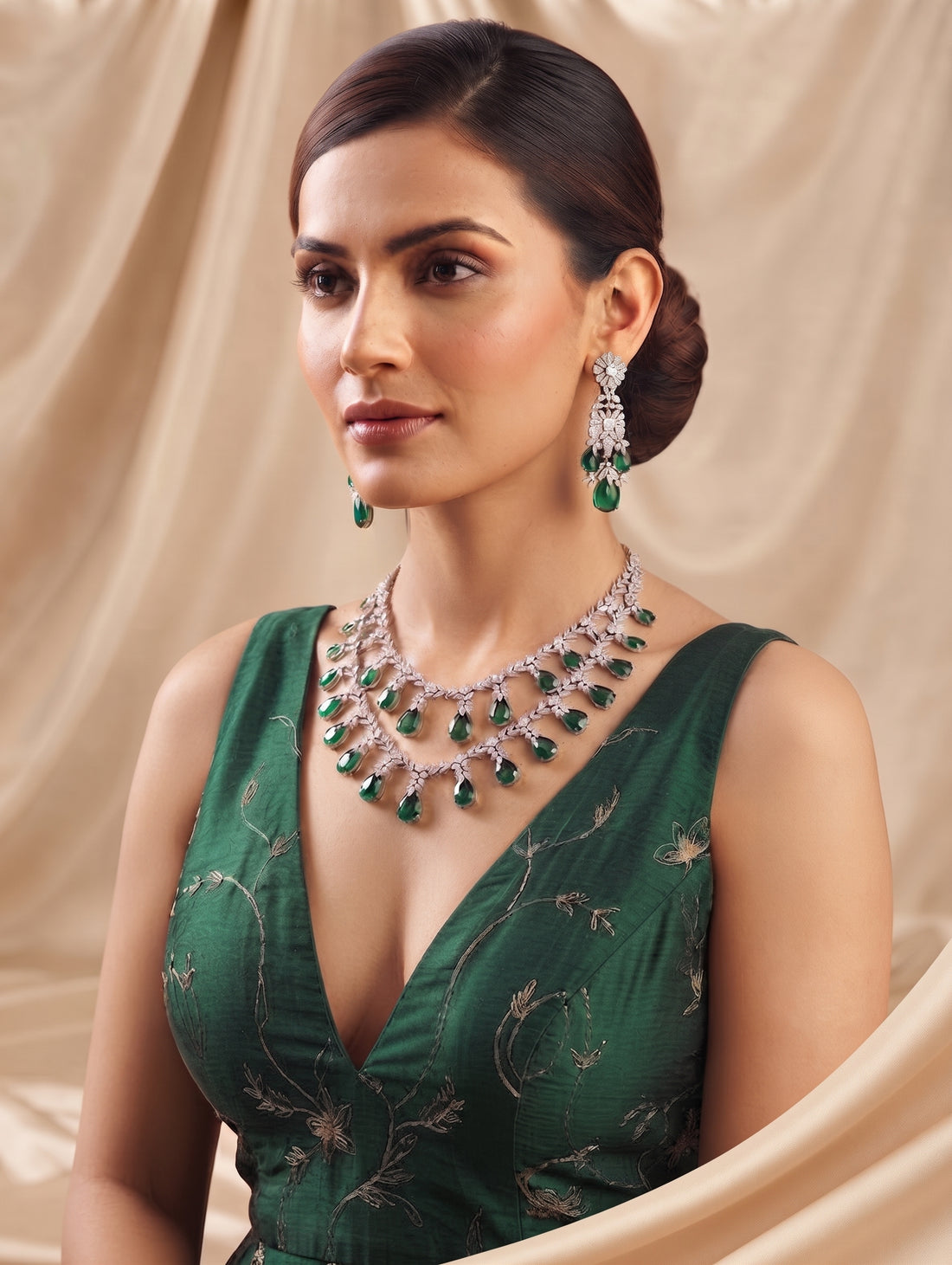Elegant rhodium contemporary necklace and earring set featuring dazzling CZ crystals with Emerald Green crystals