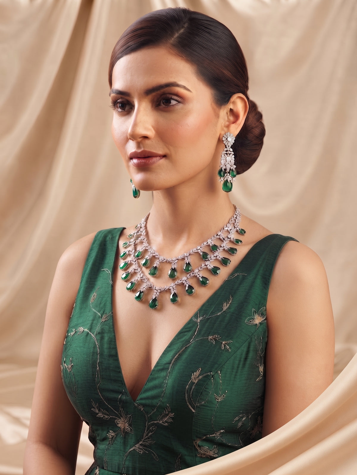 Elegant rhodium contemporary necklace and earring set featuring dazzling CZ crystals with Emerald Green crystals