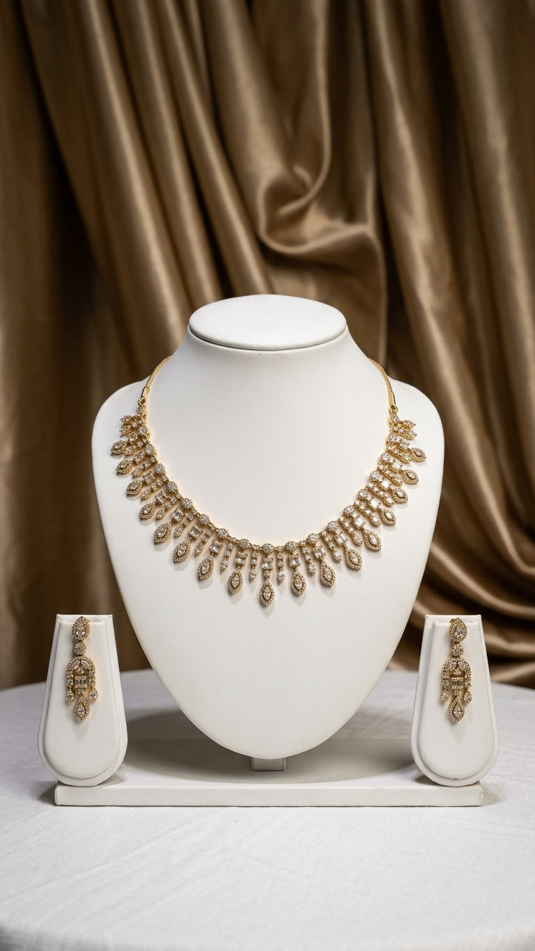 Antique gold necklace and earring set adorned with sparkling CZ stones