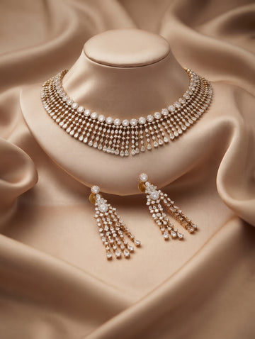 Antique gold necklace and earring set adorned with sparkling CZ stones