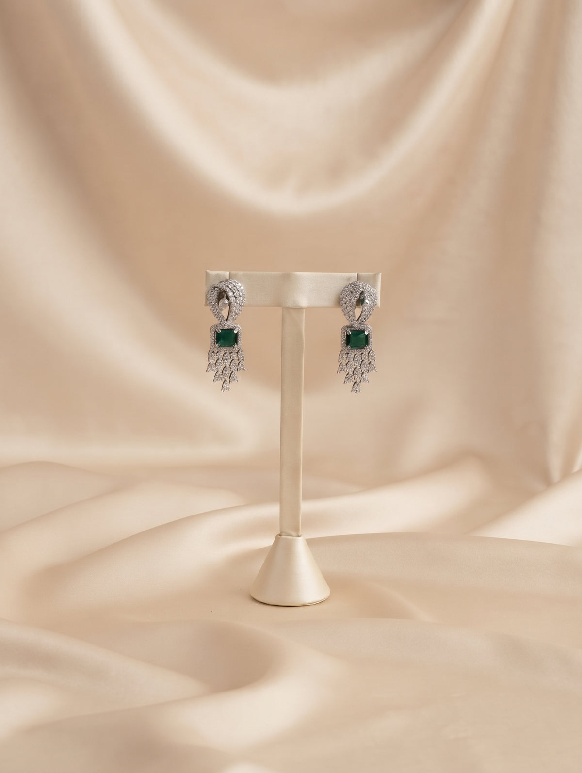 CZ crystal-embellished long rhodium-plated jewelry set with green emerald crystals