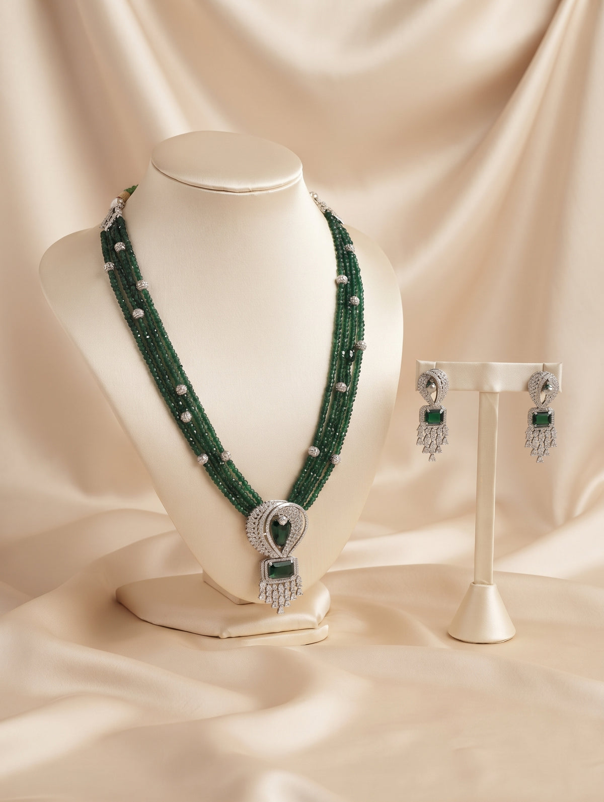 CZ crystal-embellished long rhodium-plated jewelry set with green emerald crystals