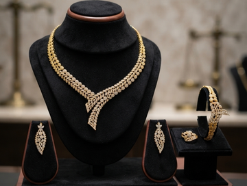 CZ crystal-embellished Gold-plated jewelry set (ring and bracelet)