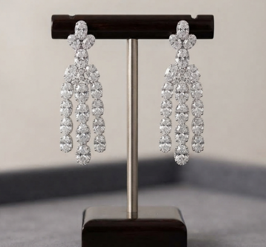 Rhodium layered necklace with matching elegant drop earrings.