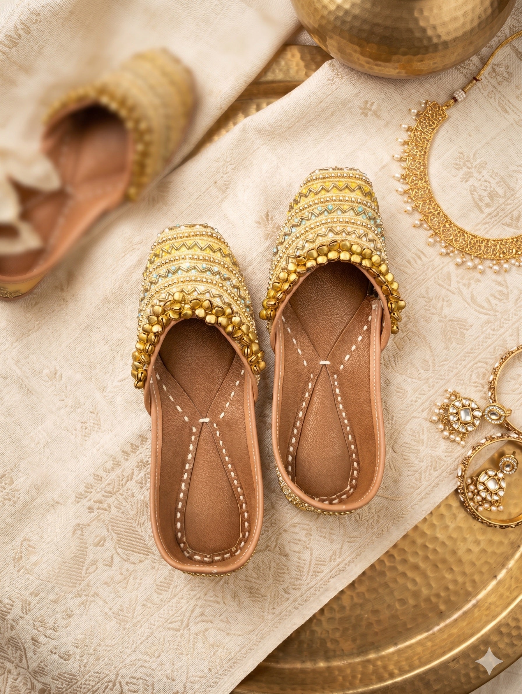 Handcrafted Pastel Yellow Chevron & Ghungroo Embellished Punjabi Juttis