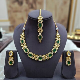 Elegant designer Kundan necklace and earring set.