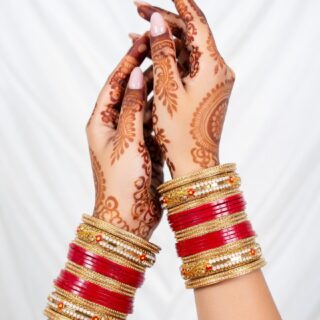 Traditional Maroon Bridal Bangles with Intricate Carvings