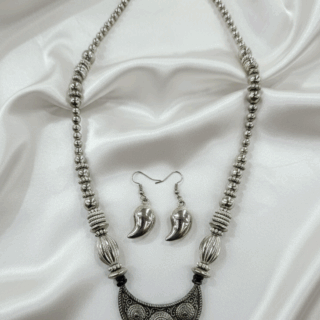Radiant Festive Style: Oxidized Silver Necklace & Earring Set