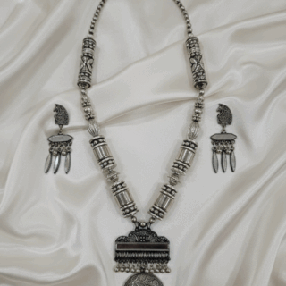 Radiant Festive Style: Oxidized Silver Necklace & Earring Set