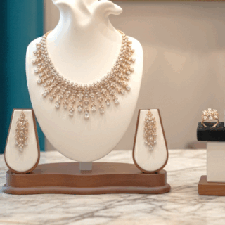 CZ crystal-embellished gold-plated jewelry set (ring and bracelet)
