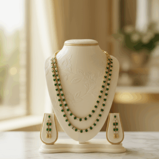 CZ crystal-embellished long gold-plated jewelry set with green, emerald crystals