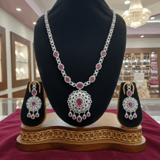CZ crystal-embellished long rhodium-plated jewelry set with ruby crystals
