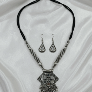 Radiant Festive Style: Oxidized Silver Necklace & Earring Set