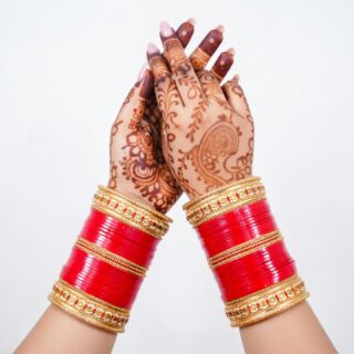 Traditional Red Bridal Bangles with Intricate Carvings