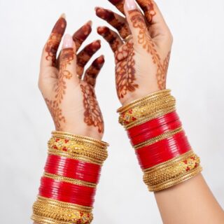 Traditional Red Bridal Bangles with Intricate Carvings